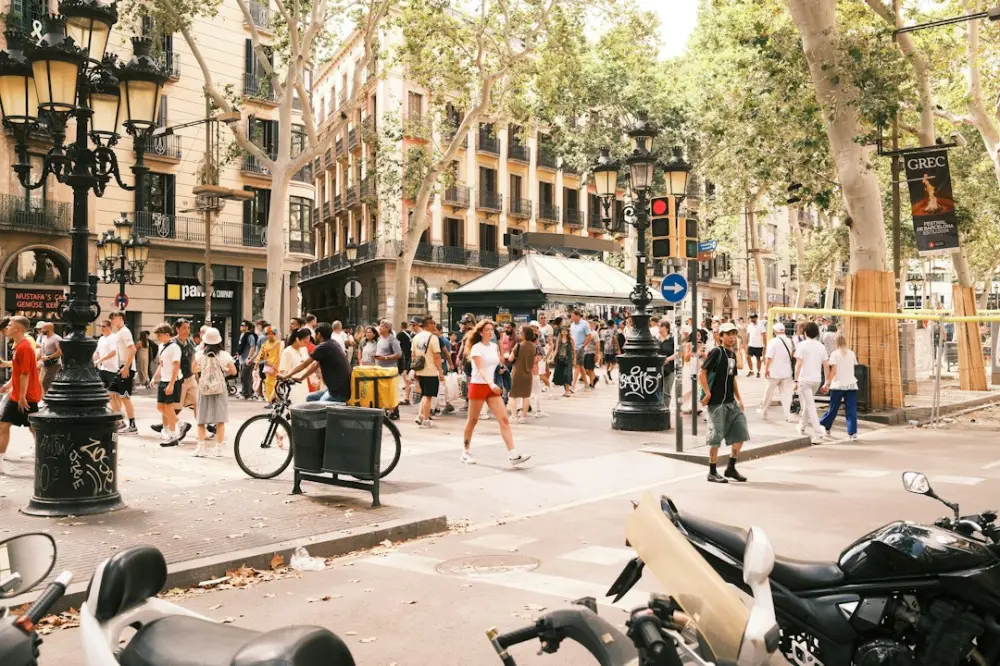 A busy city street filled with lots of people, illustrating exploring neighborhoods